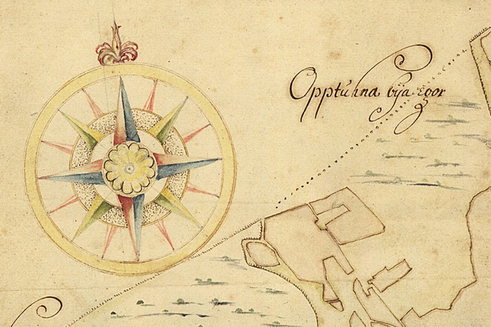 Kompassros på gammal karta.